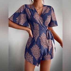 Sleeved, wrapped print romper